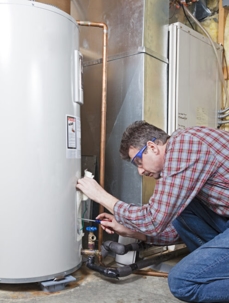 tech working water heater