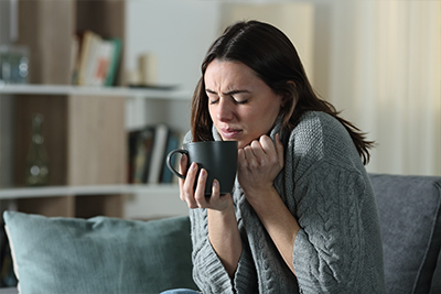 Woman cold in house