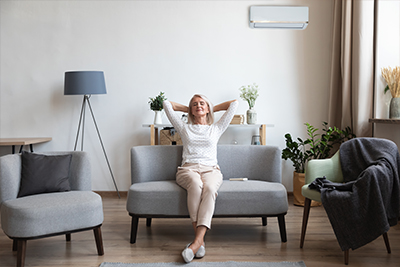 Woman enjoying good indoor air quality in home